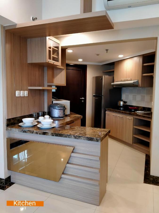 Apartemen Puncak Marina Surabaya Exterior foto